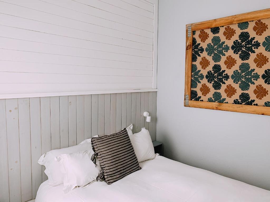 Postel nebo postele na pokoji v ubytování Boutike Guesthouse