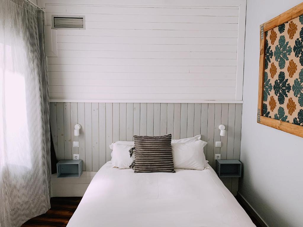 Postel nebo postele na pokoji v ubytování Boutike Guesthouse