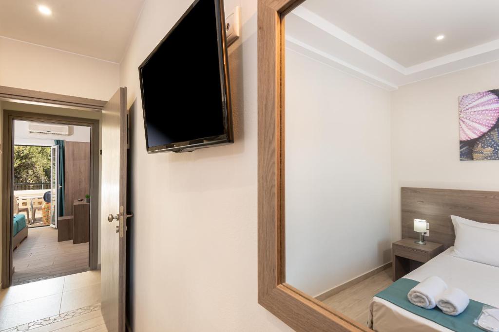 TV a/nebo společenská místnost v ubytování Sisi Breeze Hotel