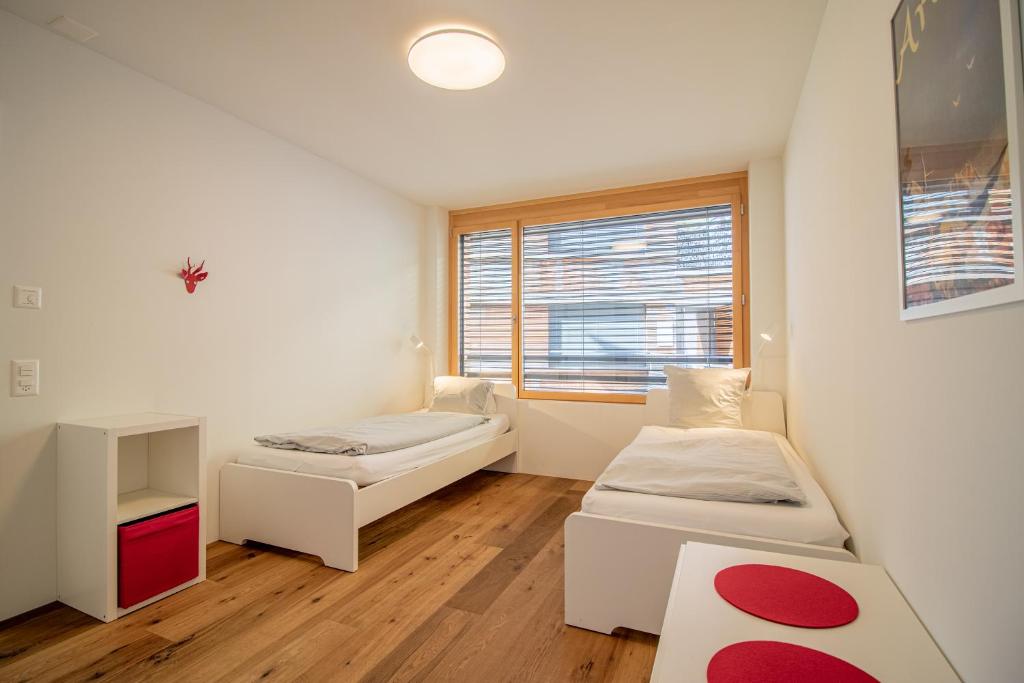 Postel nebo postele na pokoji v ubytování PlantA rosa by Arosa Holiday