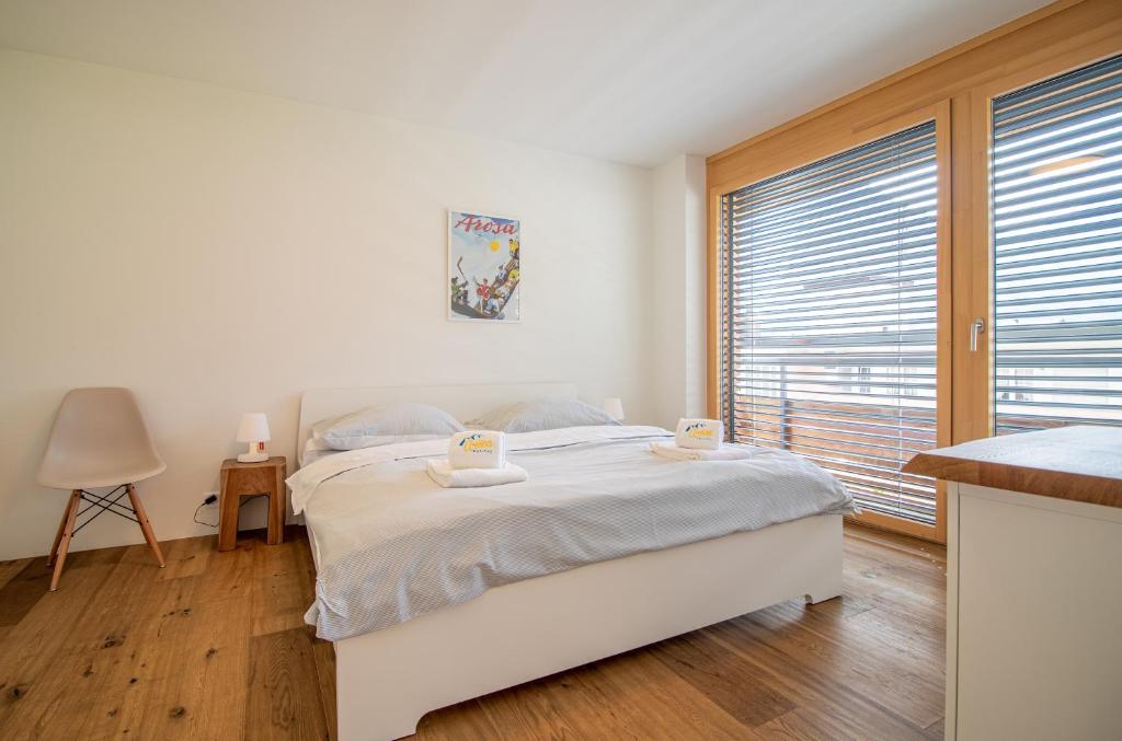 Postel nebo postele na pokoji v ubytování PlantA rosa by Arosa Holiday
