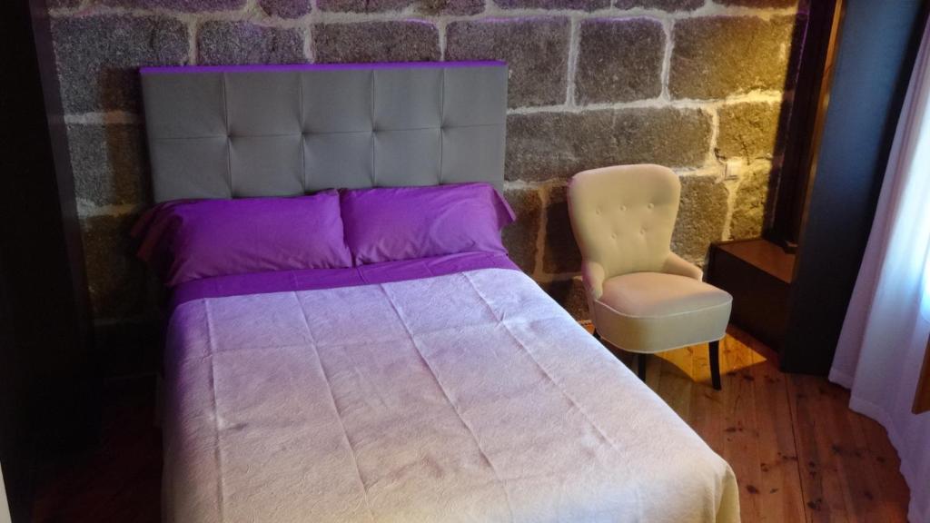 Postel nebo postele na pokoji v ubytování Hotel Rural Cayetana