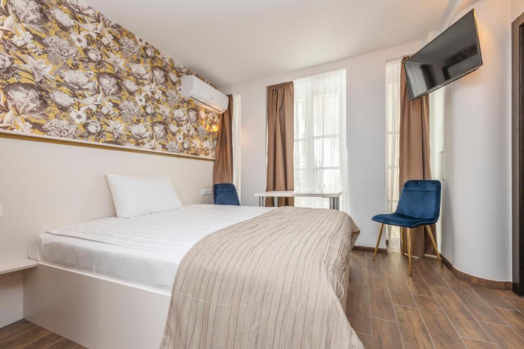 Postel nebo postele na pokoji v ubytování Kesminta Apartments