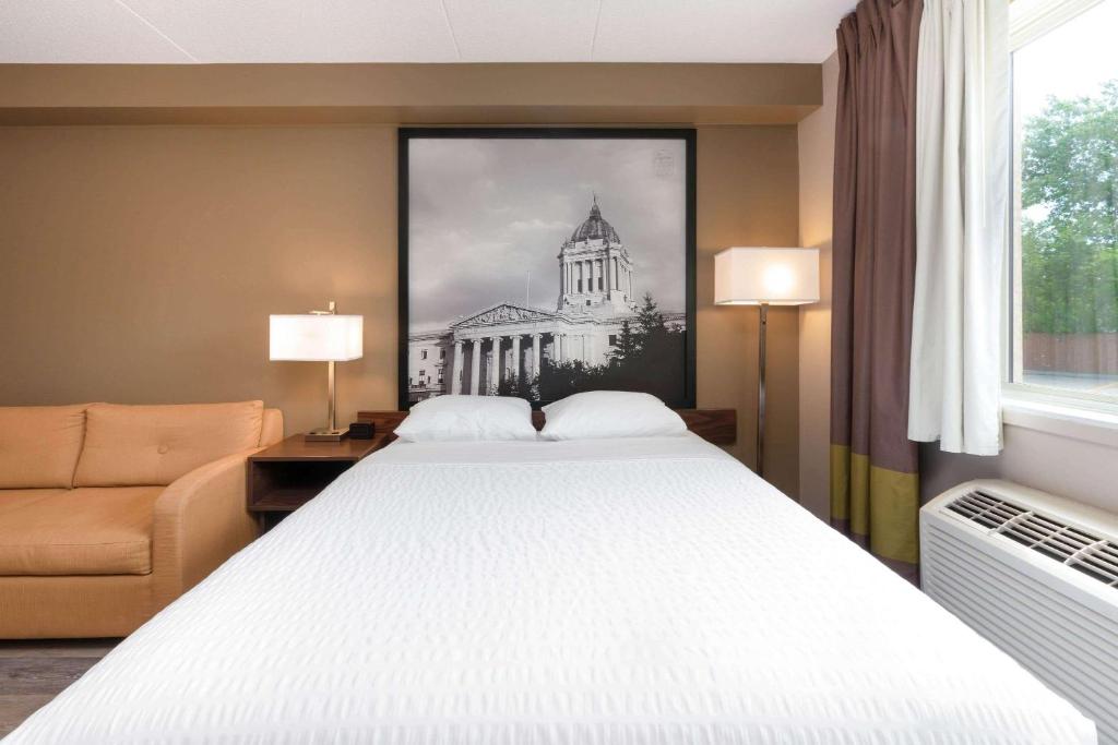 Super 8 by Wyndham Winnipeg West - Resim 42