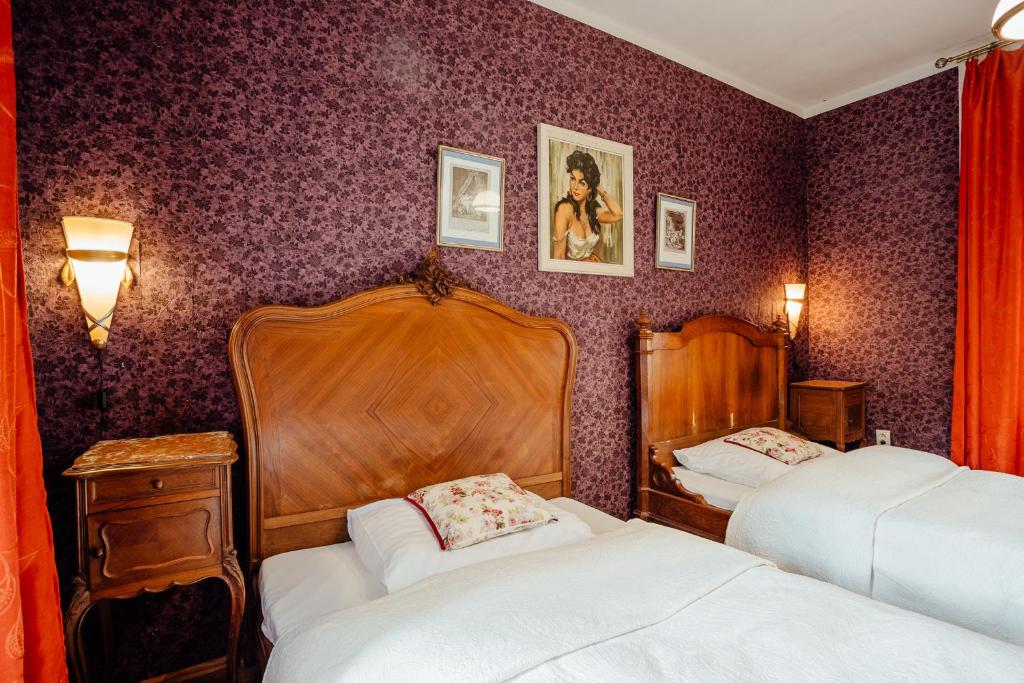 Postel nebo postele na pokoji v ubytování Hotel Barcadam