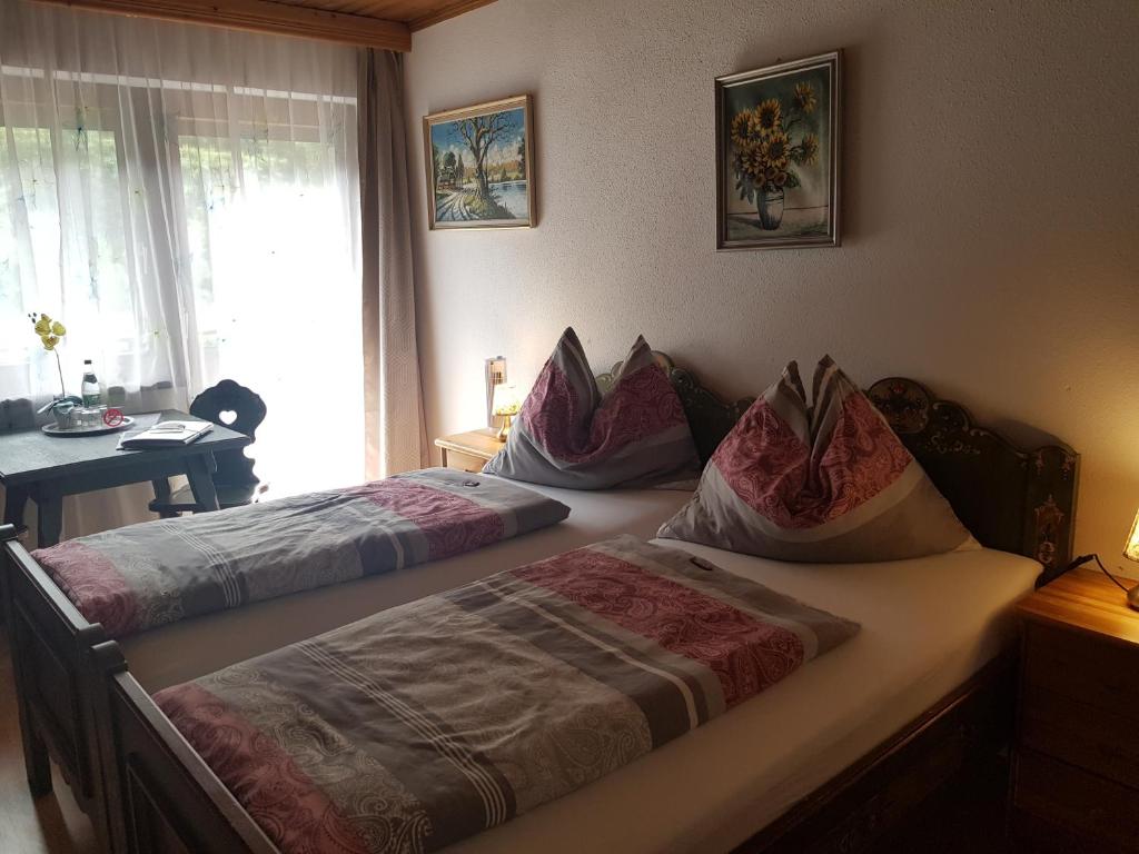 Postel nebo postele na pokoji v ubytování Hiasl Stubn