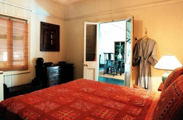 Postel nebo postele na pokoji v ubytování Pinctada McAlpine House