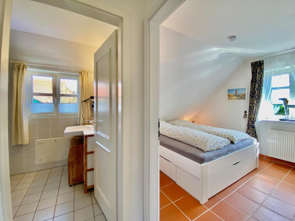 Postel nebo postele na pokoji v ubytování Strandnahe Ferienwohnung Rügen
