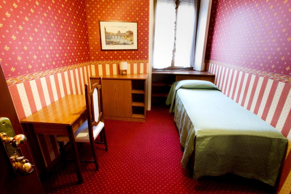Postel nebo postele na pokoji v ubytování Hotel Adriatic