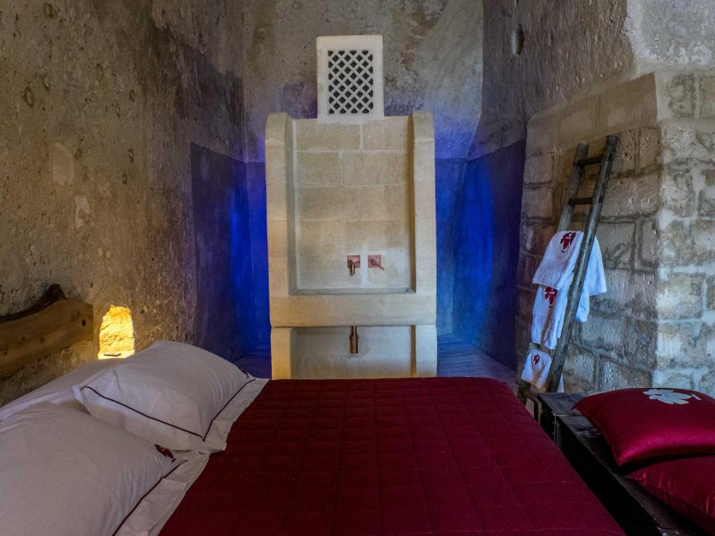 Postel nebo postele na pokoji v ubytování ENOTRIO Barisano
