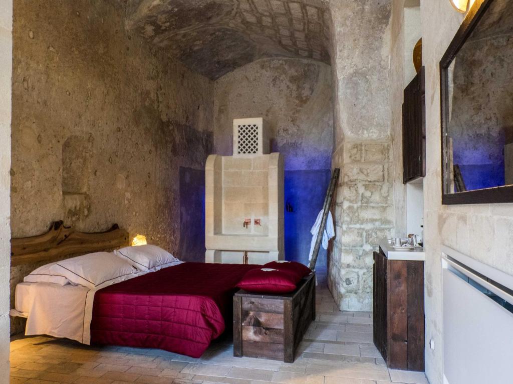 Postel nebo postele na pokoji v ubytování ENOTRIO Barisano