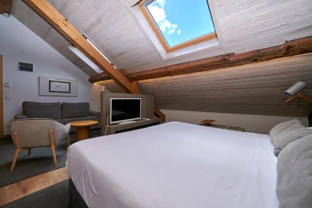 TV a/nebo společenská místnost v ubytování Hostal Lola