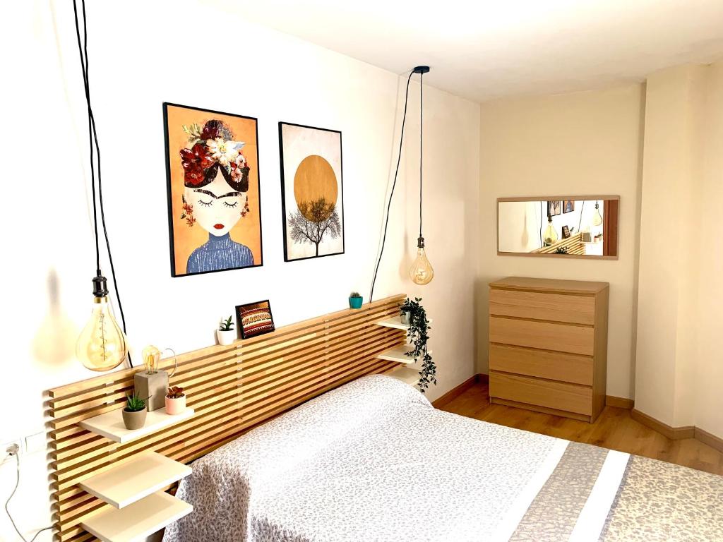 Postel nebo postele na pokoji v ubytování Apartamento playa Boiro
