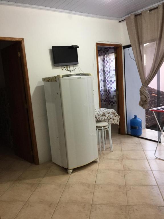 Pé na areia