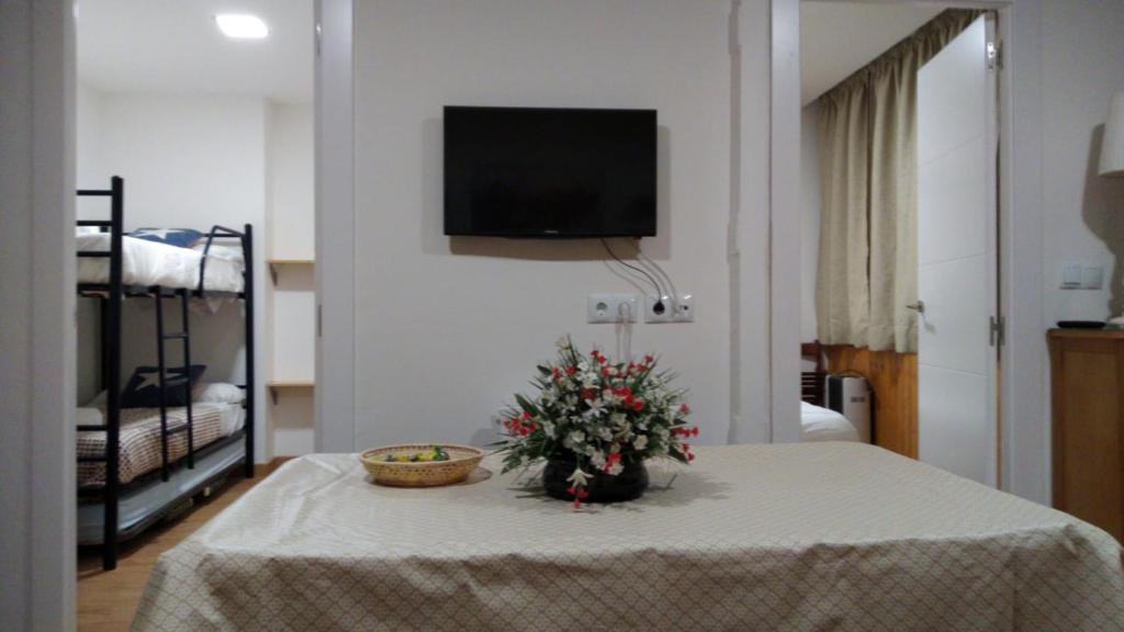 Posteľ alebo postele v izbe v ubytovaní edificio primavera zona baja