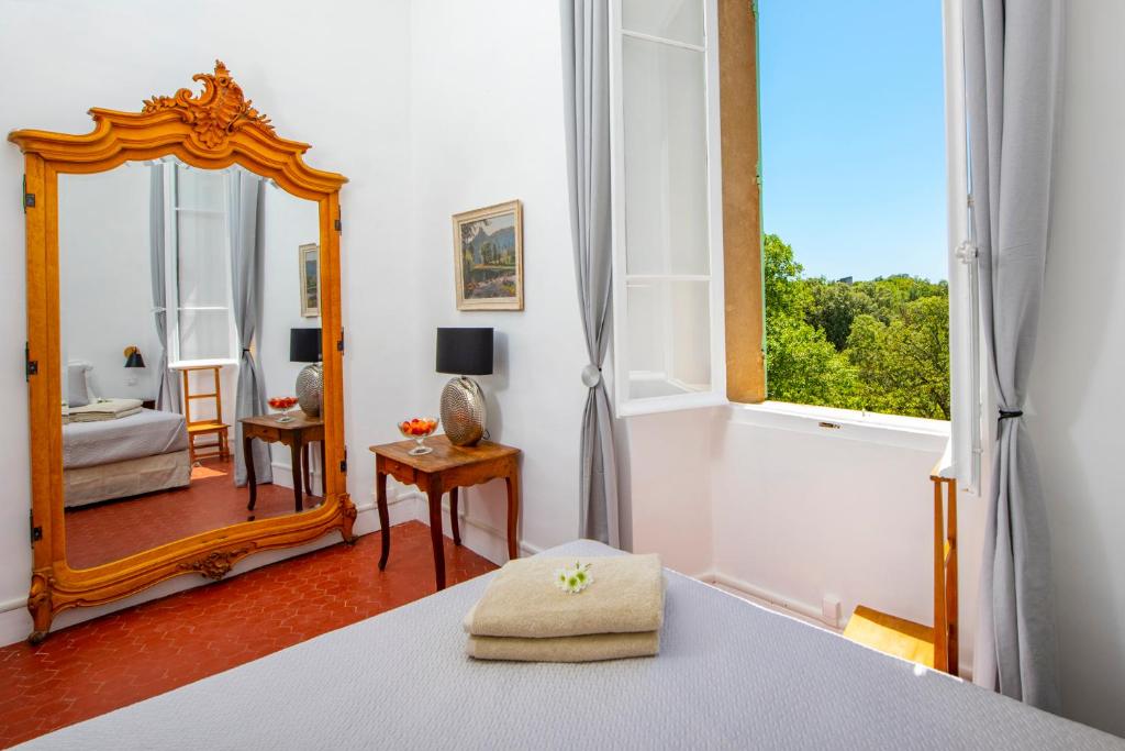 Postel nebo postele na pokoji v ubytování Bastide Saint-Estève