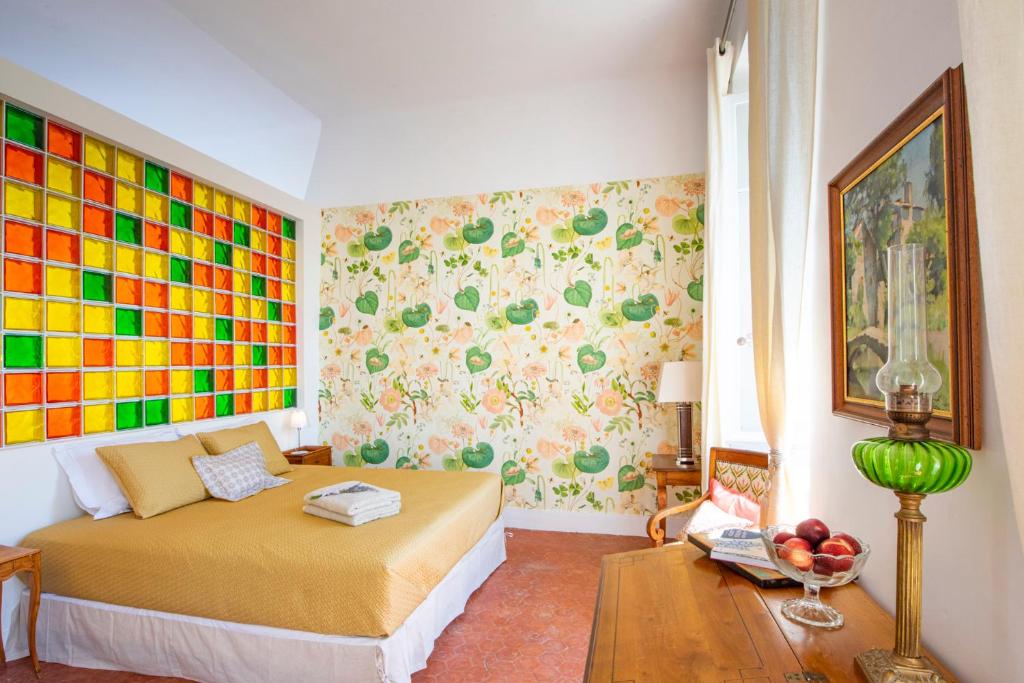 Postel nebo postele na pokoji v ubytování Bastide Saint-Estève