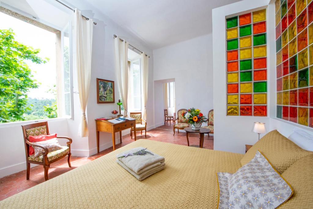 Postel nebo postele na pokoji v ubytování Bastide Saint-Estève