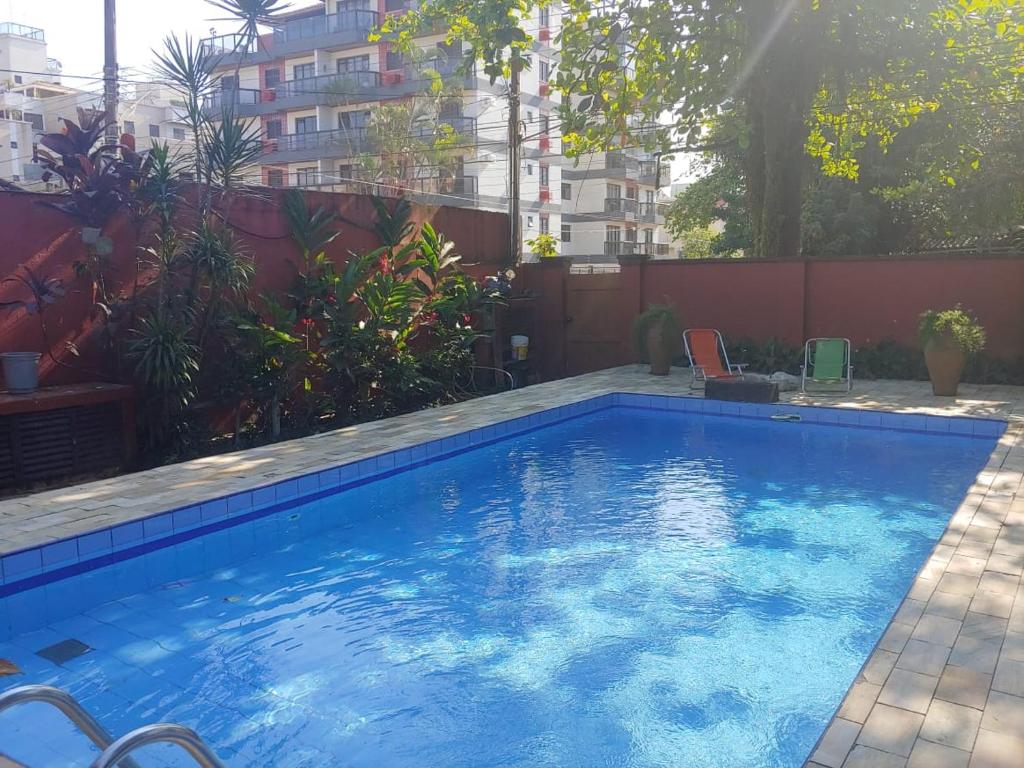  LINDA E CONFORTÁVEL CASA COM PISCINA NO GUARUJÁ