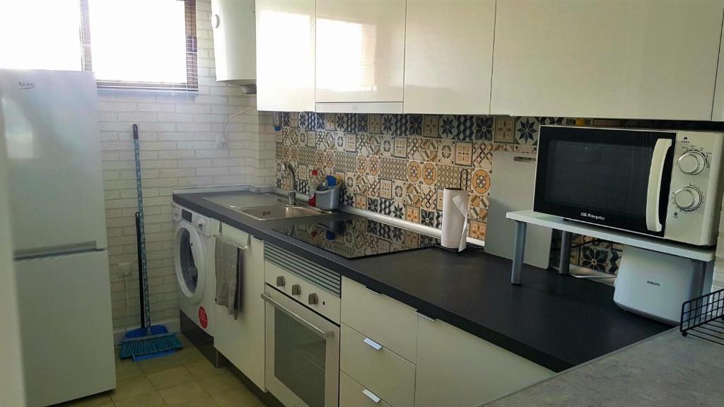 Kuchyň nebo kuchyňský kout v ubytování SweetWater Home - Apartamento ideal para tus vacaciones
