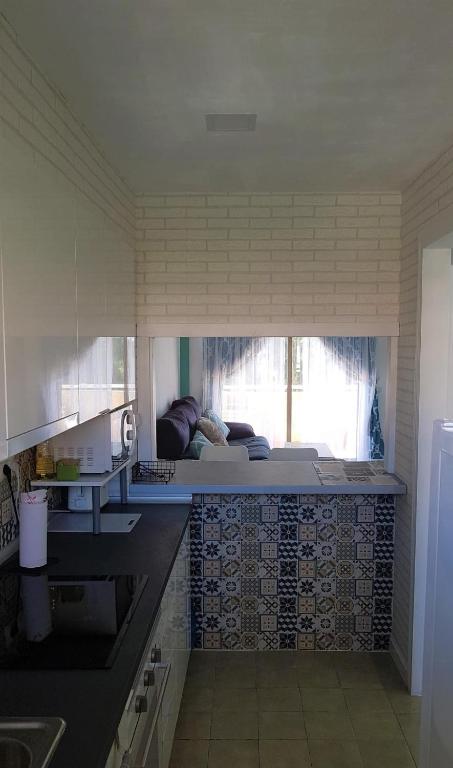Kuchyň nebo kuchyňský kout v ubytování SweetWater Home - Apartamento ideal para tus vacaciones