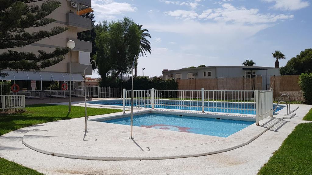 Bazén v ubytování SweetWater Home - Apartamento ideal para tus vacaciones nebo v jeho okolí