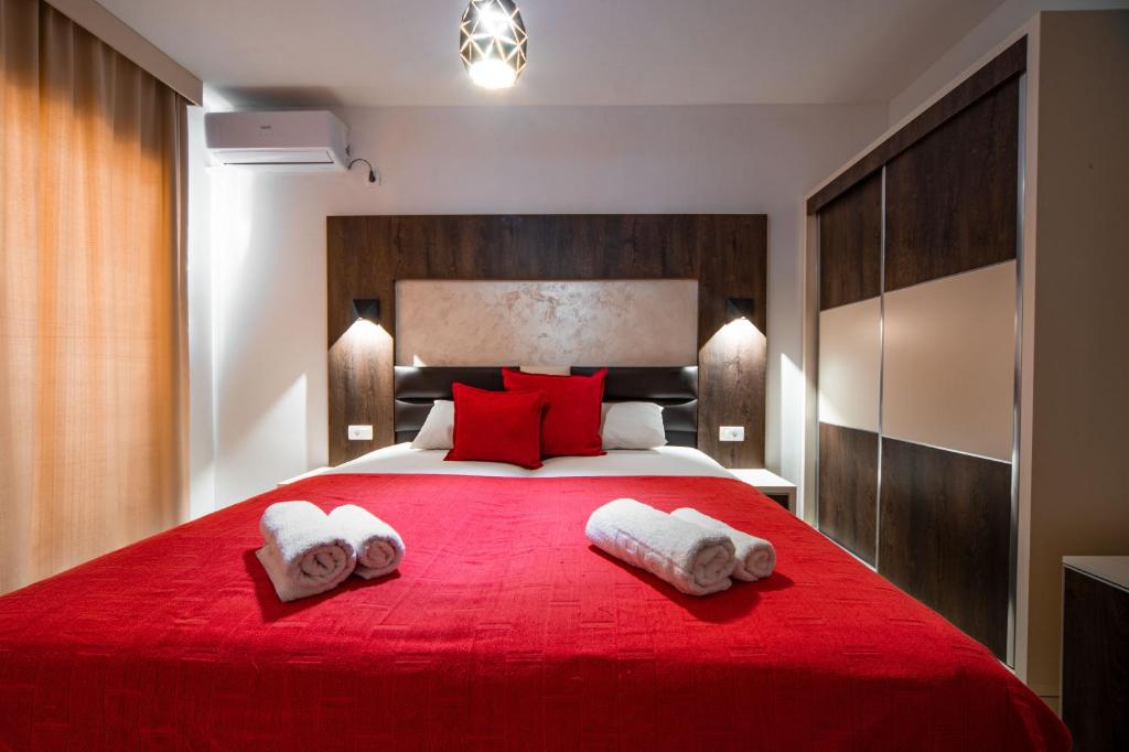 Postel nebo postele na pokoji v ubytování David Lux beach rooms