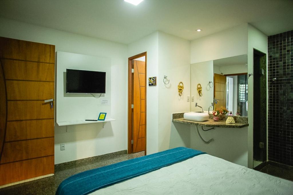 SEGUNDA CASA - Seu cantinho em Guarapari, 1 minuto a pé da Praia do Morro! Suítes confortáveis e modernas - Para casal ou para grupos de até 4 pessoas - Suite