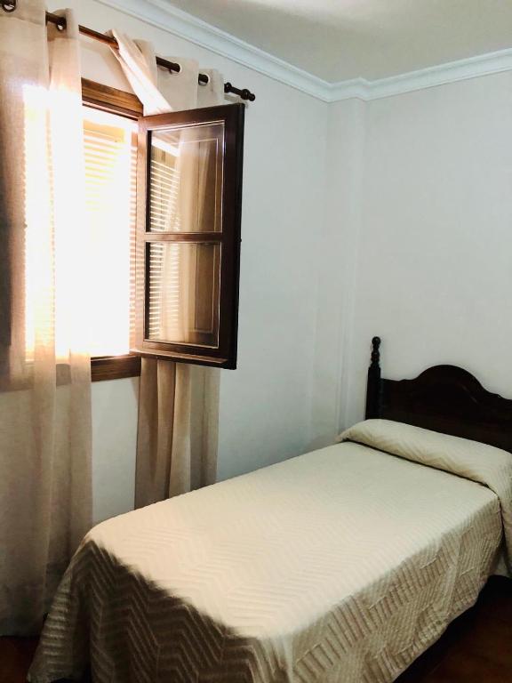 Postel nebo postele na pokoji v ubytování Hotel La Yedra