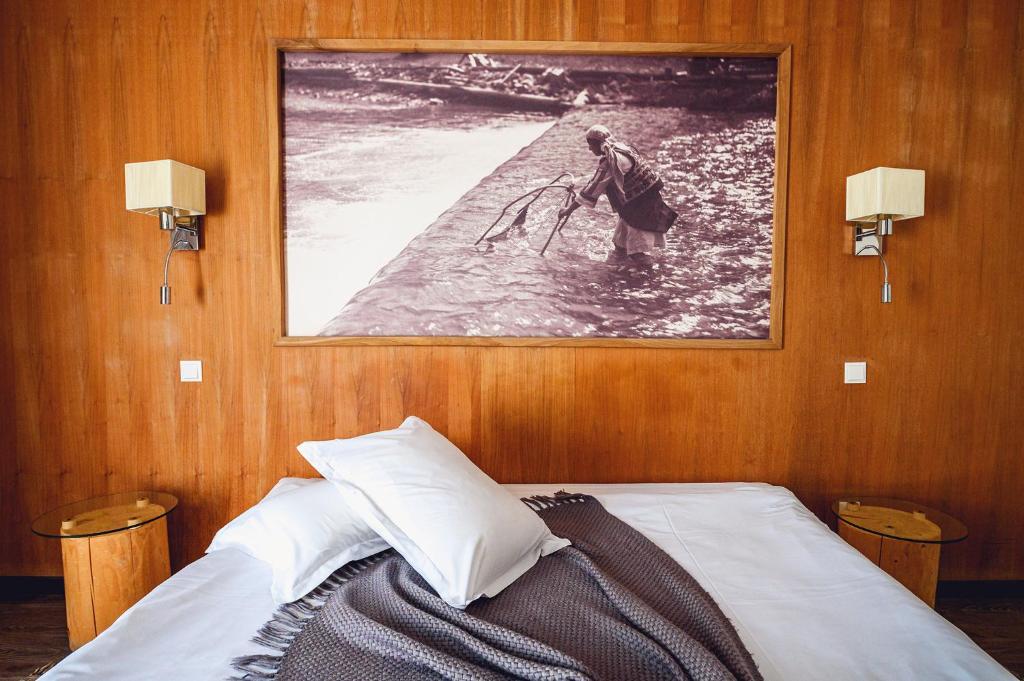 Postel nebo postele na pokoji v ubytování Pension Pîrîu' Morii