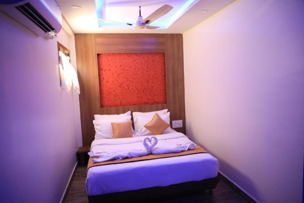 Postel nebo postele na pokoji v ubytování The K11 Hotels - T Nagar