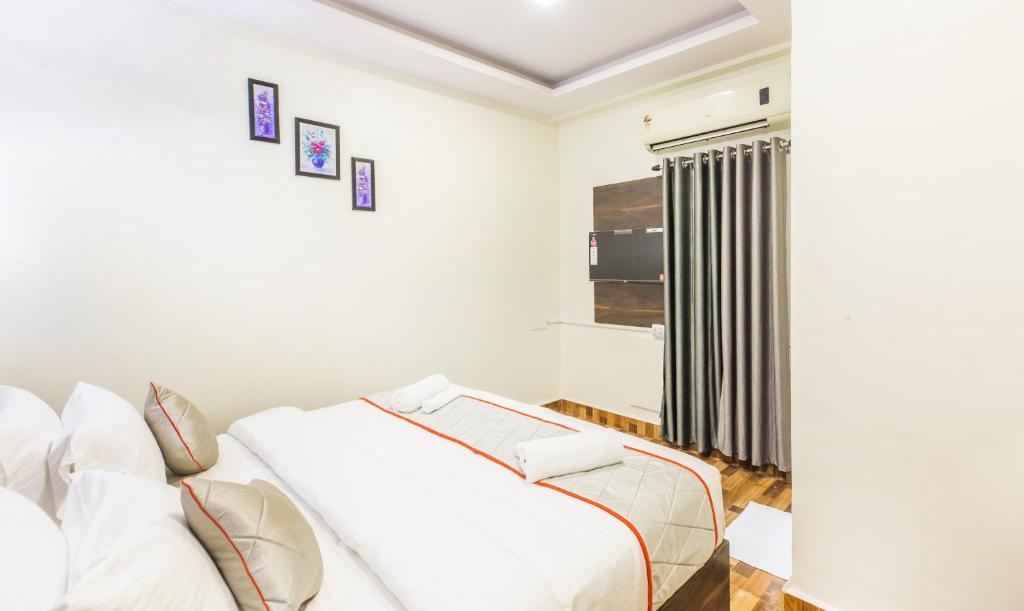 Postel nebo postele na pokoji v ubytování The K11 Hotels - T Nagar