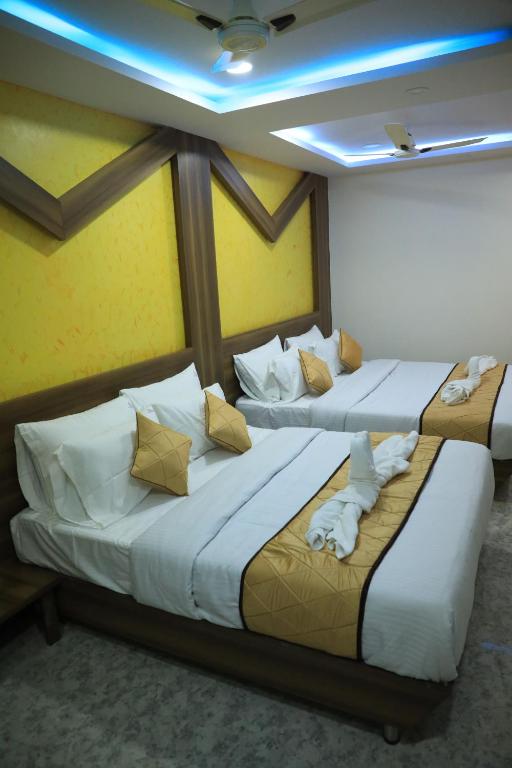 Postel nebo postele na pokoji v ubytování The K11 Hotels - T Nagar