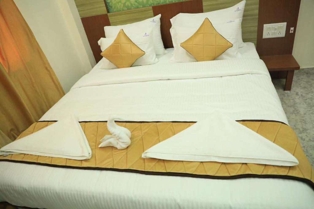 Postel nebo postele na pokoji v ubytování The K11 Hotels - T Nagar