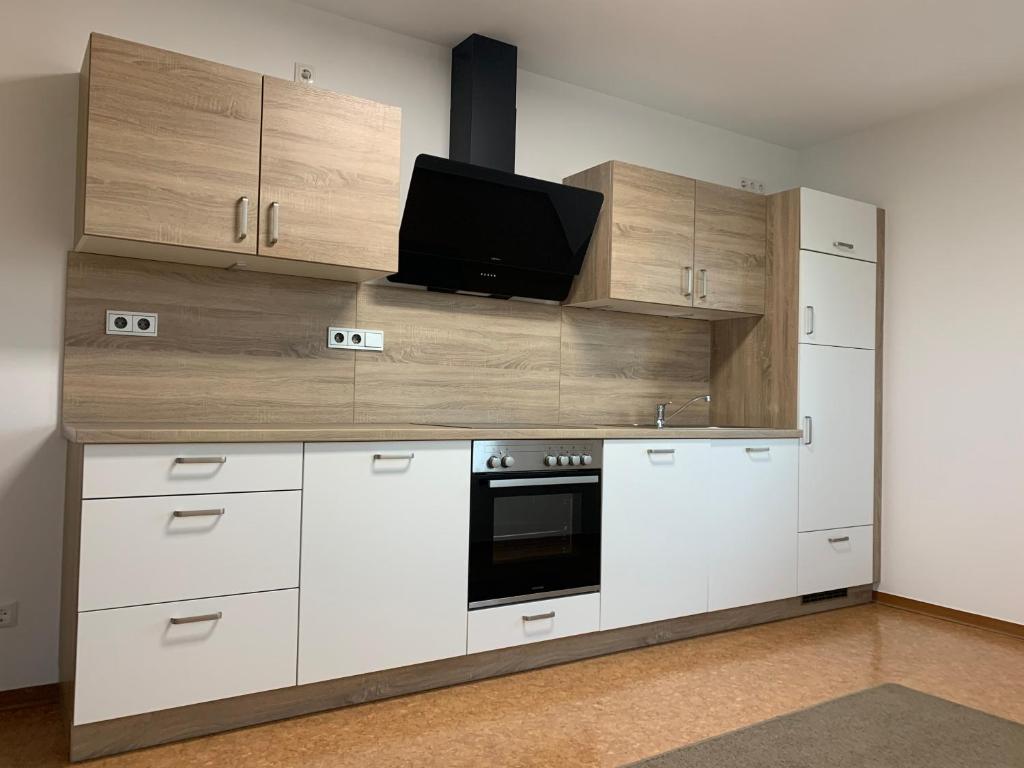 Kuchyň nebo kuchyňský kout v ubytování Ferienoberwohnung in Villa Pesca
