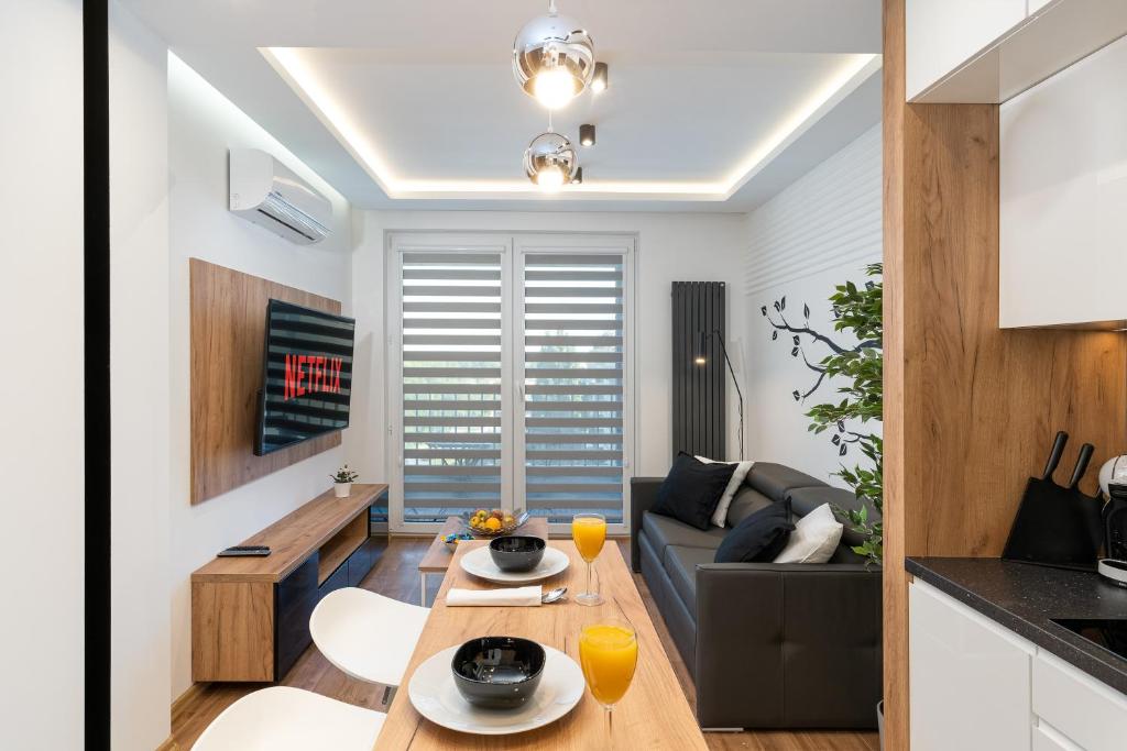 Televízia a/alebo spoločenská miestnosť v ubytovaní Comfort, prestige, best location Romanowicza 1