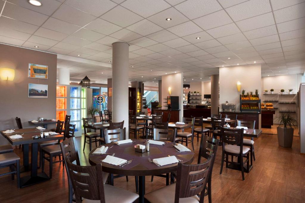 Restaurace v ubytování Ramada Encore by Wyndham Geneva