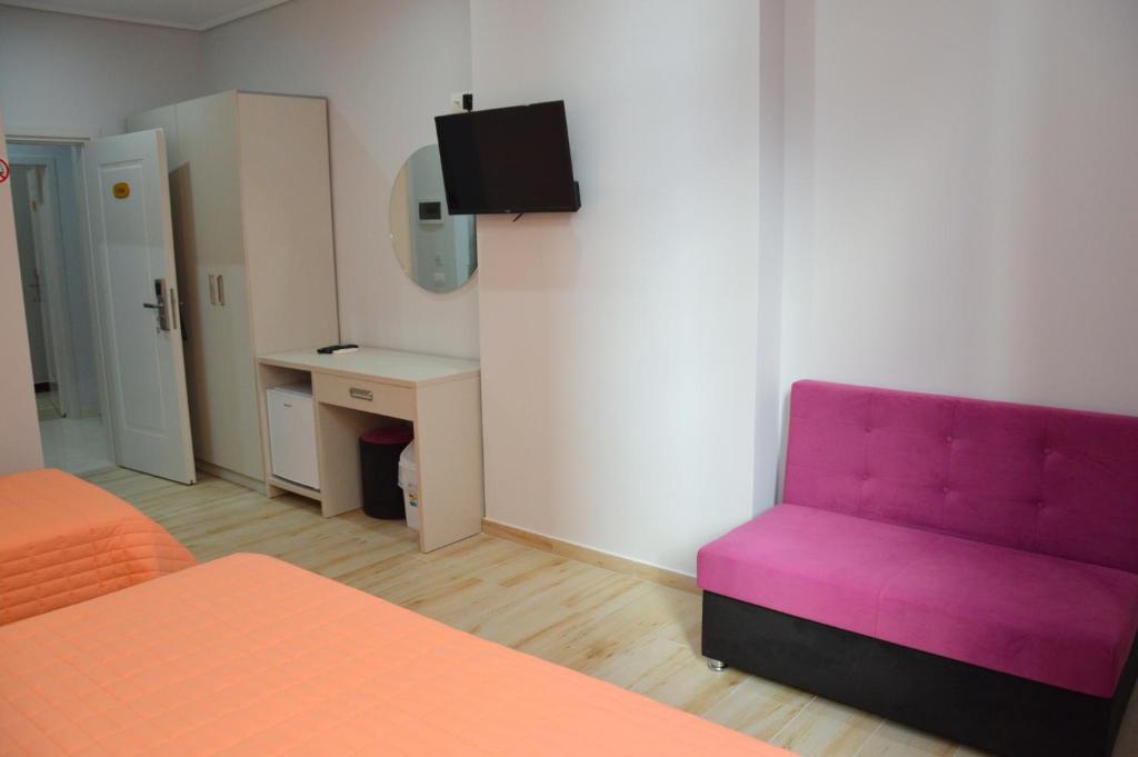 TV a/nebo společenská místnost v ubytování Hotel Beler