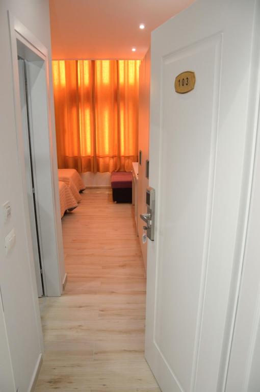 Postel nebo postele na pokoji v ubytování Hotel Beler