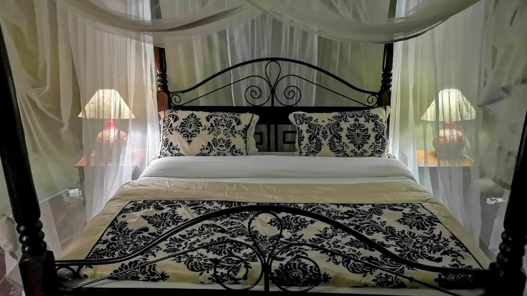 Ein Bett oder Betten in einem Zimmer der Unterkunft Osero Lodge