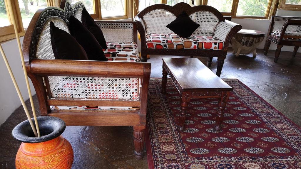 Ein Sitzbereich in der Unterkunft Osero Lodge