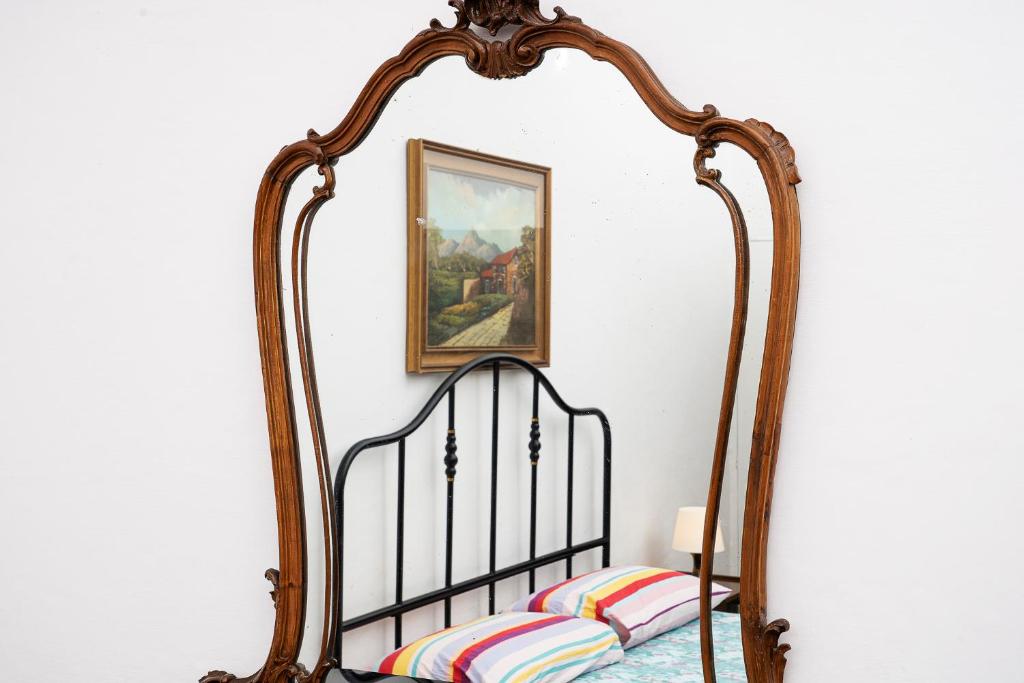 A bed or beds in a room at La Perpetua