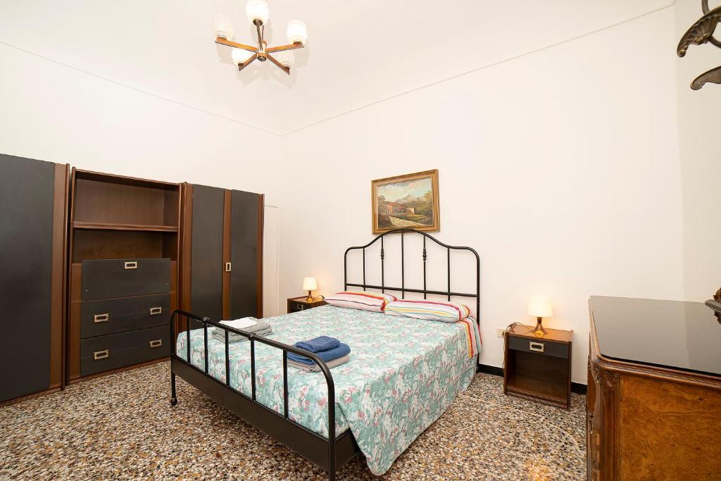 A bed or beds in a room at La Perpetua