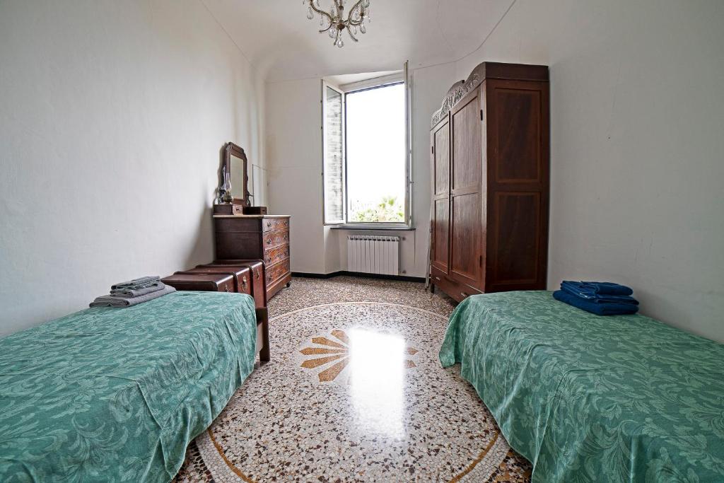 A bed or beds in a room at La Perpetua