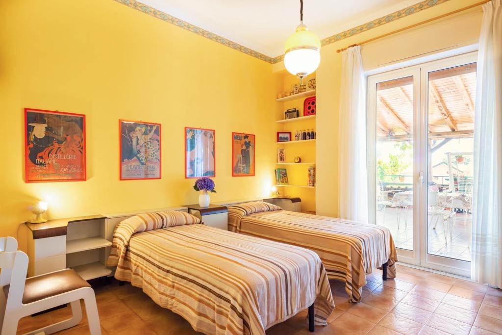 Posteľ alebo postele v izbe v ubytovaní Casa Clò