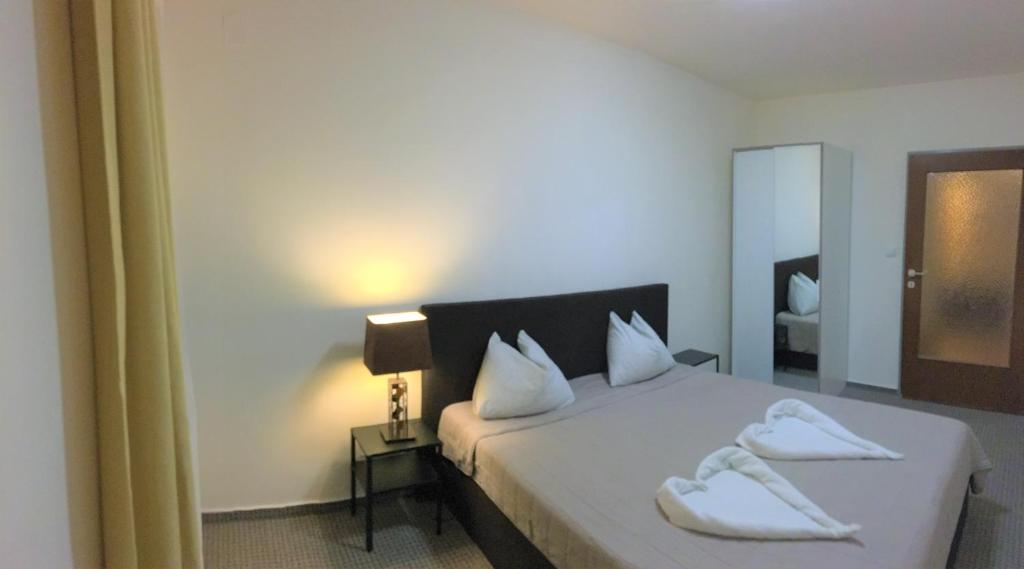 Postel nebo postele na pokoji v ubytování Ski Vital Apartments