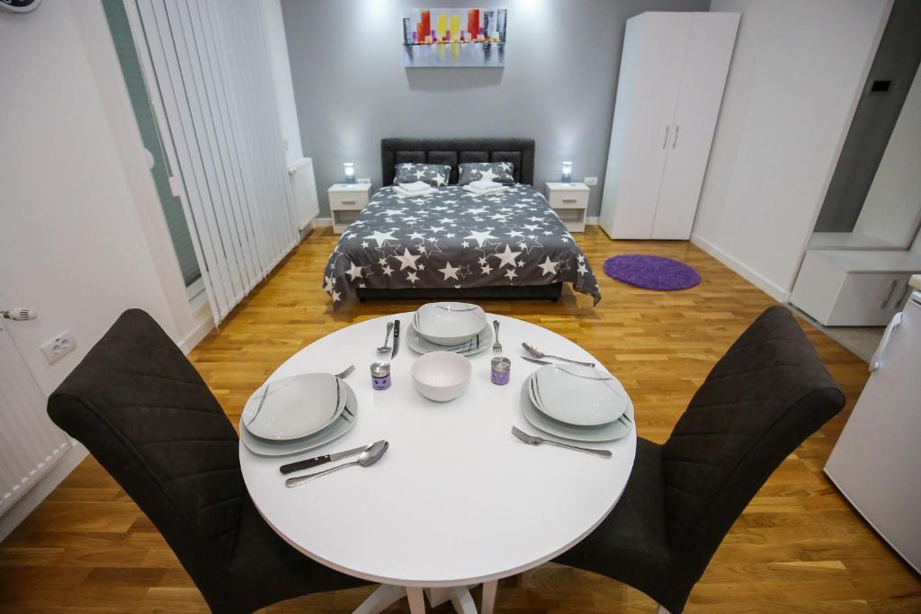 Postel nebo postele na pokoji v ubytování MANIROSI 3 apartman
