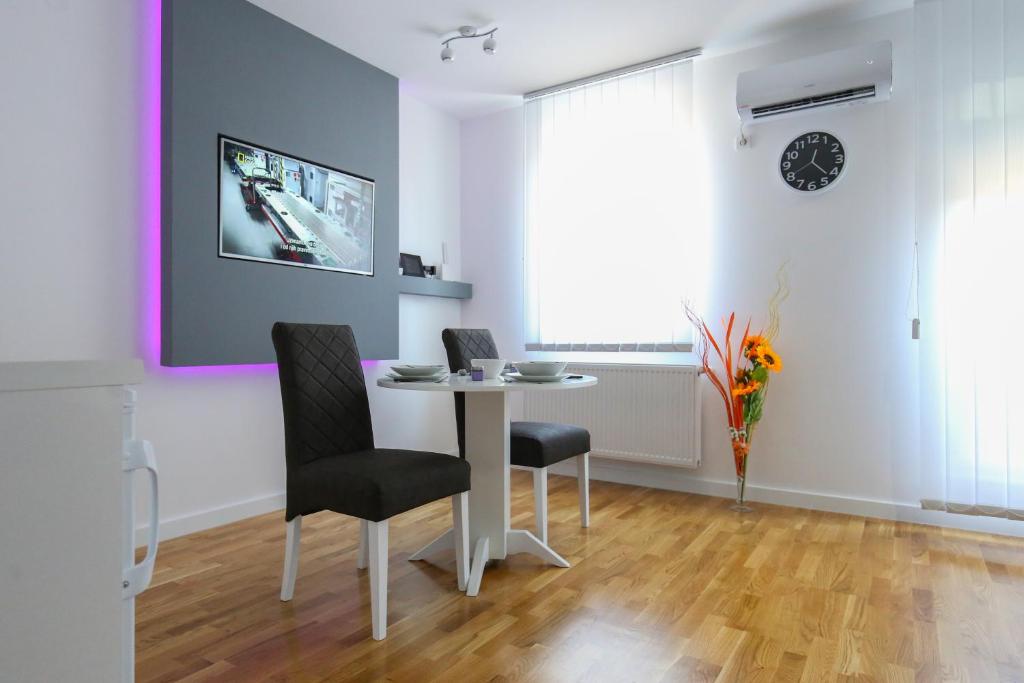 TV a/nebo společenská místnost v ubytování MANIROSI 3 apartman