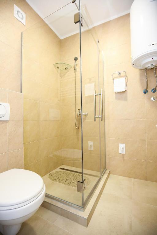 Koupelna v ubytování MANIROSI 3 apartman
