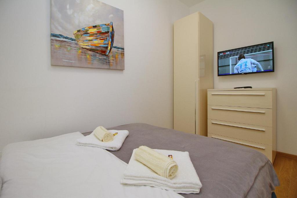 Postel nebo postele na pokoji v ubytování Vila Pekovic green-Apartman PAMA
